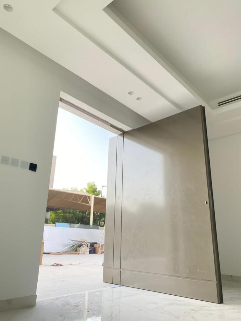 Pivot Door- Pivot Door - Front View Villa Living Legend Dubai UAE